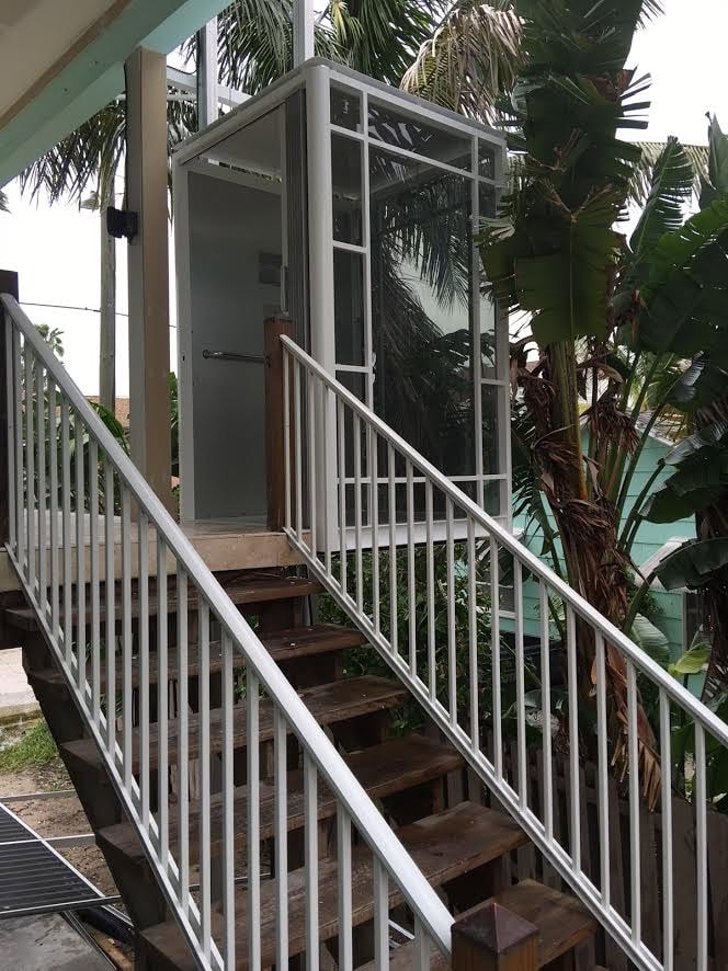 Stair lift in modern coastal home