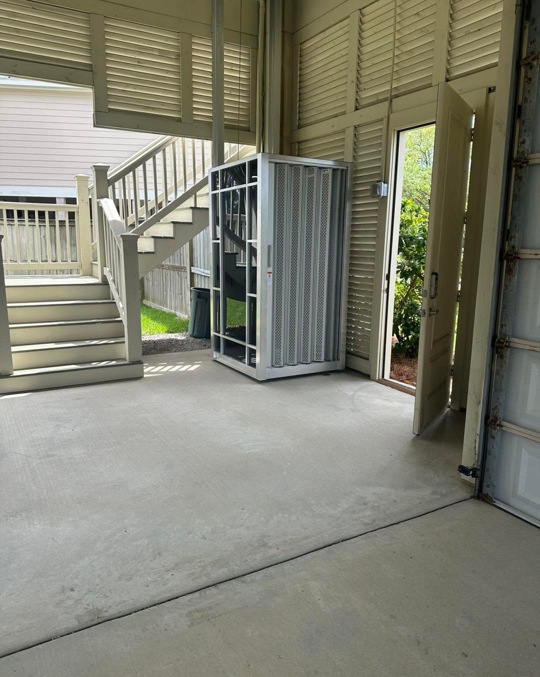 Coastal cargo lift installation on elevated beach house